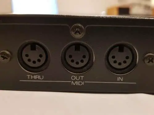 Picture of MIDI ports - IN, OUT, and THRU